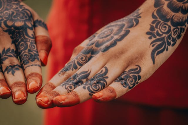 Henna Decoration A woman's hands elaborately decorated with henna tattoos