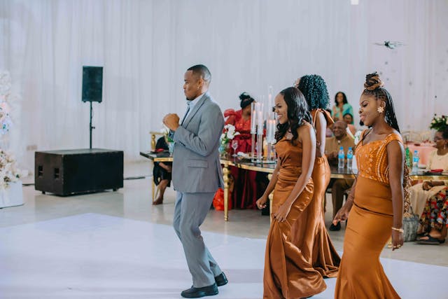 Wedding Dance A groom and three bridesmaids dancing at the reception