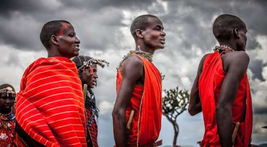 An African tribe wearing traditional tribal clothing.