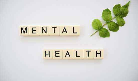 A sign spelling 'Mental Health.'